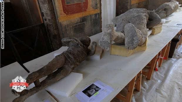 A picture shows petrified victims of the eruption of Vesuvius volcano in 79 BC، during the restoration work and the study of 86 casts in the laboratory of Pompeii Archaeological Site، on May 20، 2015 in Pompeii. AFP PHOTO / MARIO LAPORTA (Photo credit should read MARIO LAPORTA/AFP/Getty Images)