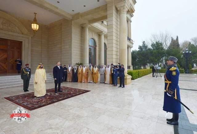 BAKU، AZERBAIJAN - APRIL 02: Vice President and Prime Minister of the United Arab Emirates (UAE) Mohammed bin Rashid Al Maktoum (L) is seen next to Azerbaijani President Ilham Aliyev (L 2) during his official visit in Baku، Azerbaijan on April 2، 2015. (Photo by Azerbaijani Presidency/Anadolu Agency/Getty Images)