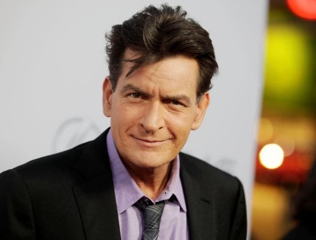 Cast member Charlie Sheen poses at the premiere of his new film "Scary Movie 5" in Hollywood، in this file photo taken April 11، 2013. Sheen is expected to make a 'revealing personal announcement' on the NBC Today Show Tuesday morning in a live interview، according to news reports. REUTERS/Fred Prouser/Files